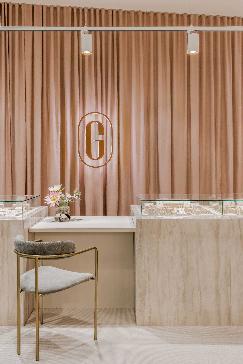 Garen Jewellery's modern showroom featuring jewellery displays.